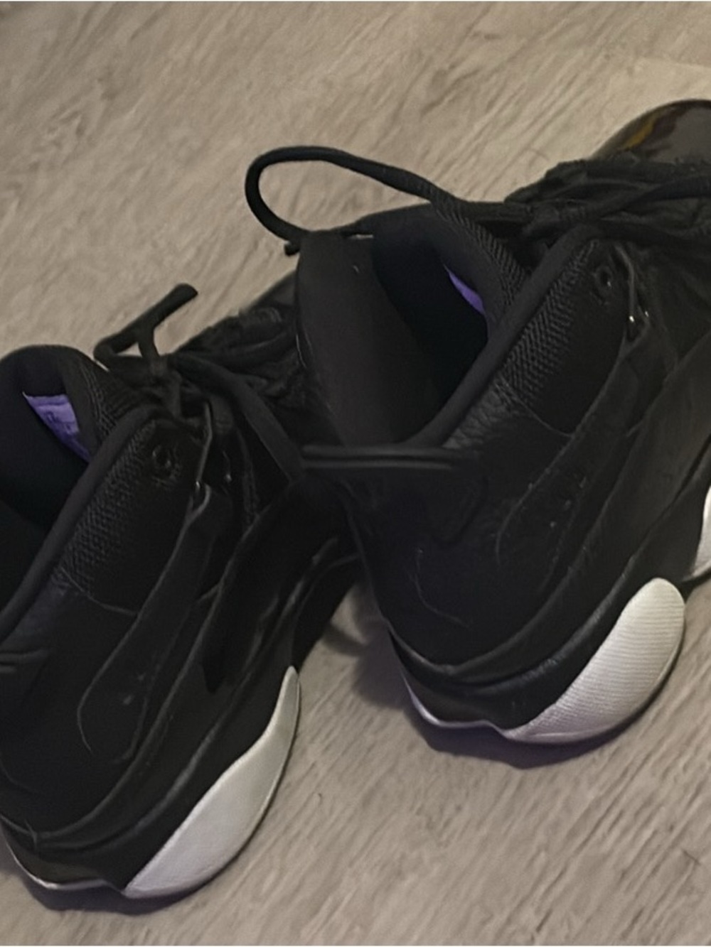 Jordan Kids Black Sneakers with White Sole and Purple Accent